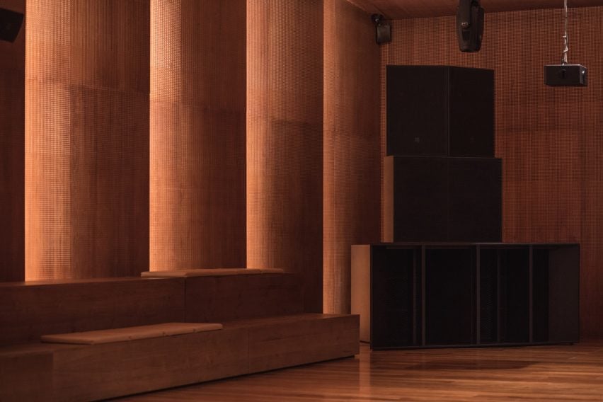 Speakers mounted on concrete slabs that absorb vibrations