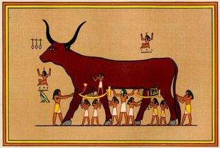 A huge red bull, depicted on parchment or old cloth, is cared for by many skirt-clad, long-haired individuals underneath.