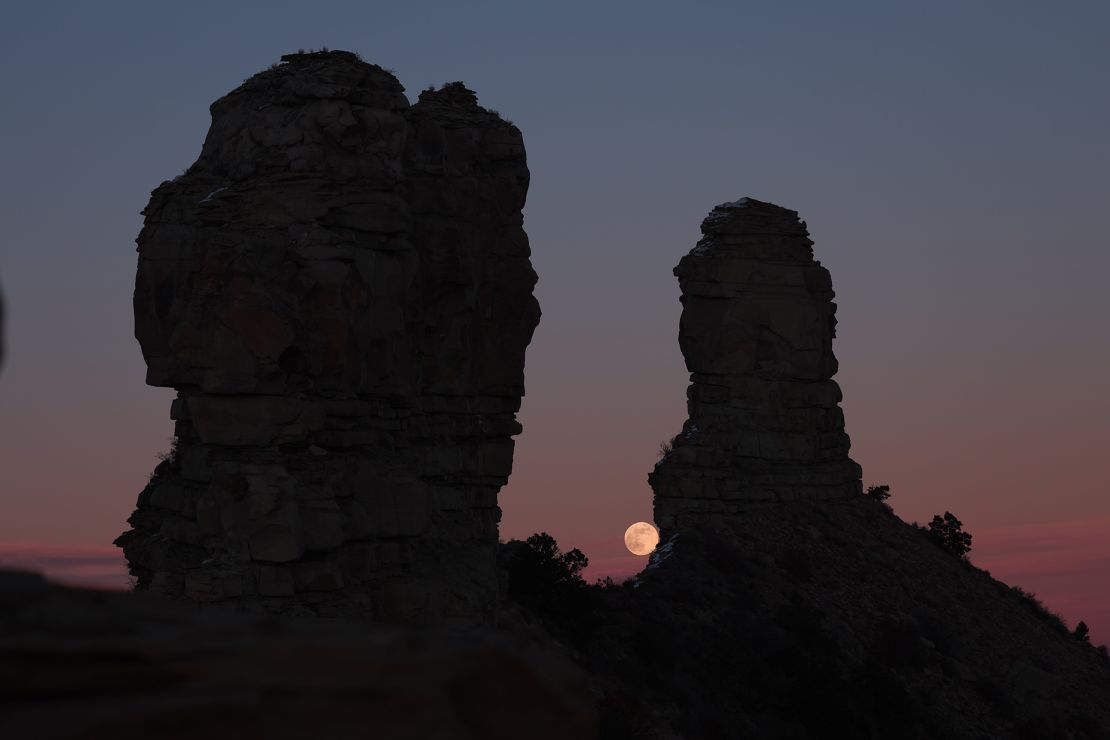 Researchers study lunar alignments at Chimney Rock, Colorado, here at full moonrise on December 26, 2023.