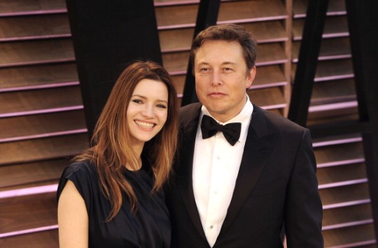 Actress Talulah Riley (left) and CEO of Tesla Motors Elon Musk arrive at the 2014 Vanity Fair Oscar Party on March 2, 2014 