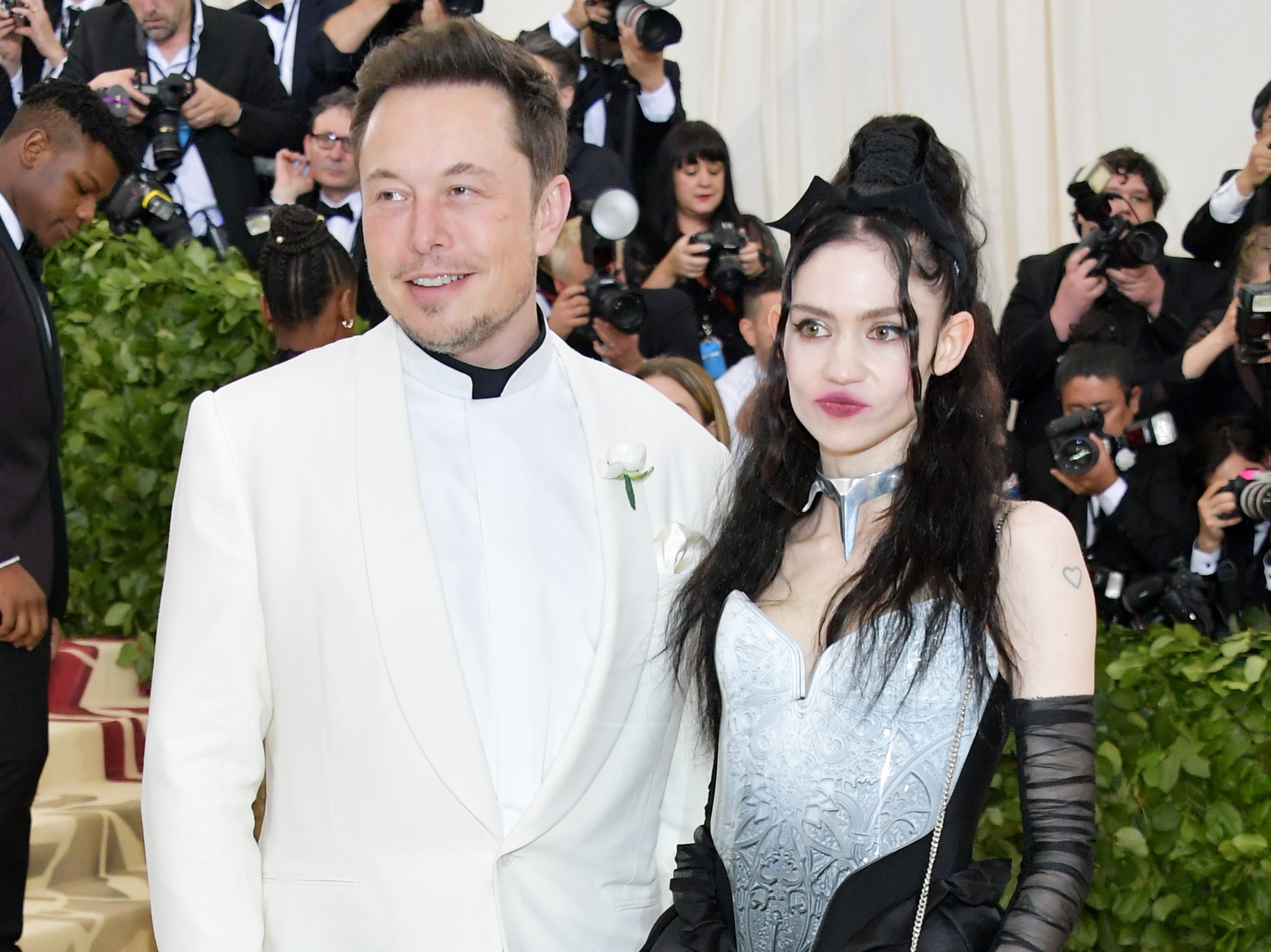 Elon Musk and Grimes at the Met Gala 2018. The couple has three children together